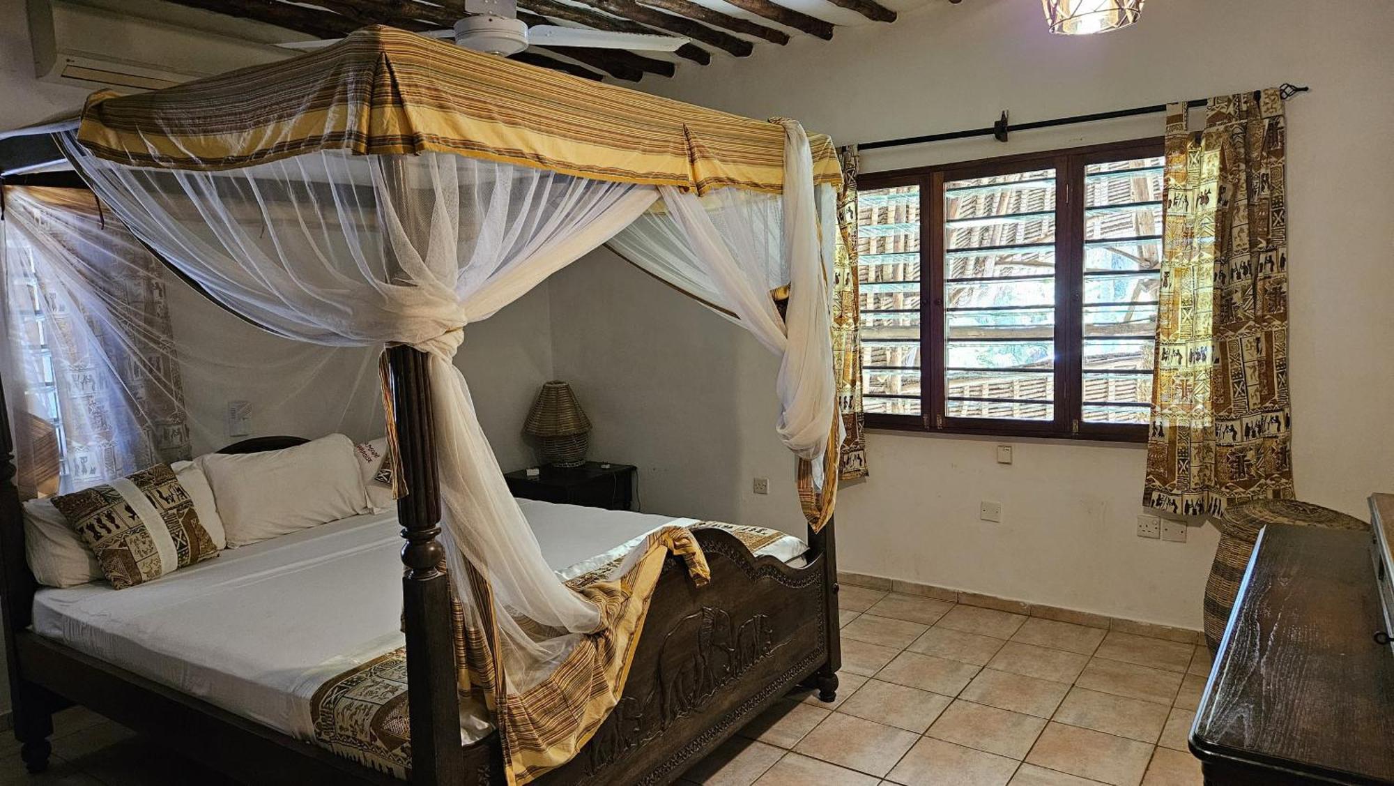 Amani Paradise - Luxury Villas 迪亚尼海滩 外观 照片